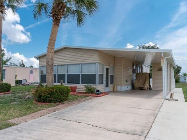 7412 WIDNESS LANE, PORT CHARLOTTE, FL 33981