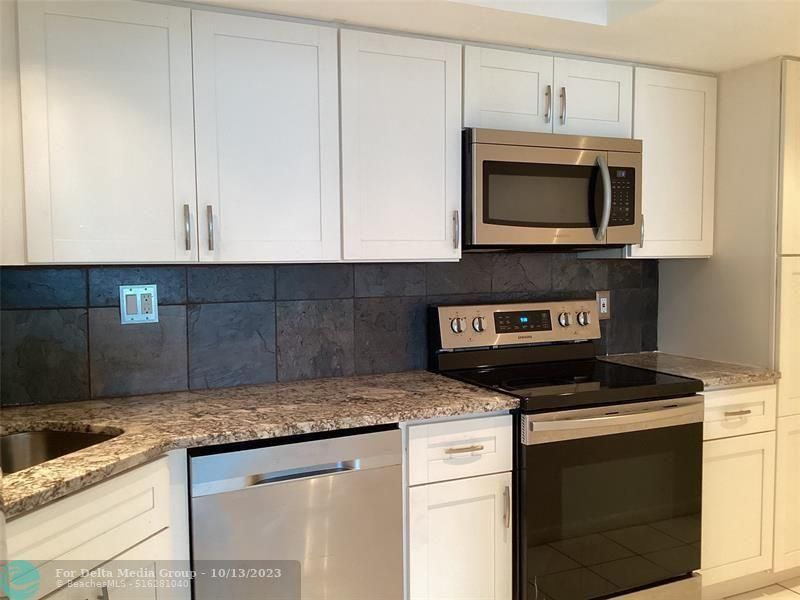 100 Golden Isles Drive, Unit 4-414, Hallandale Beach, FL 33009 Photo