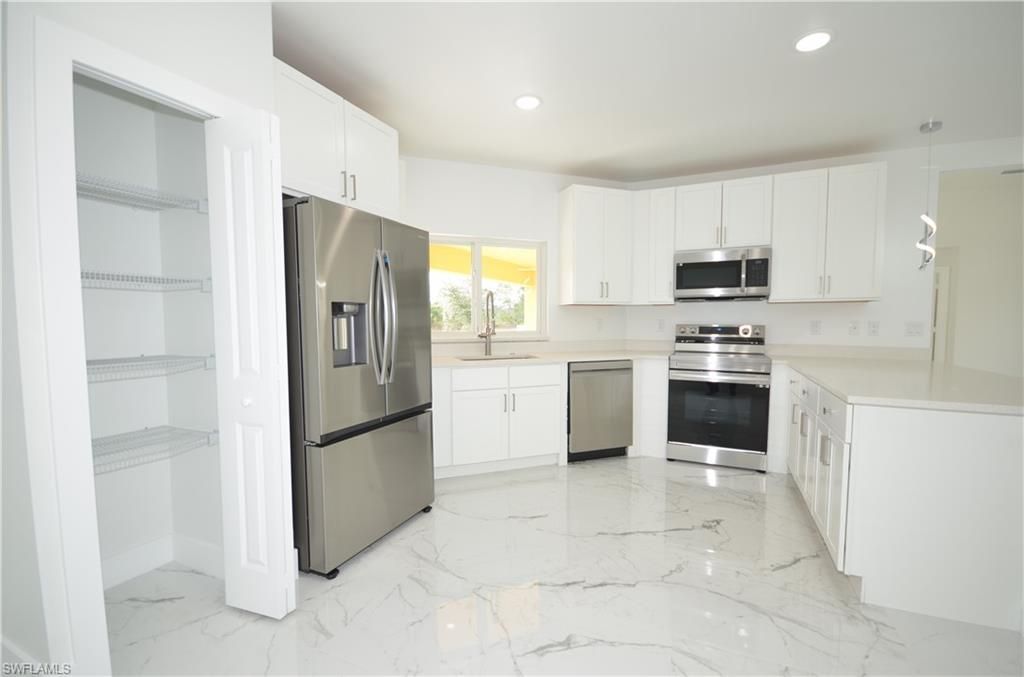 1132 Edelweiss St E, Lehigh Acres, FL 33974 Photo