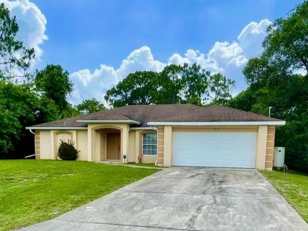 1825 Tomaso AVE, LEHIGH ACRES, FL 33972