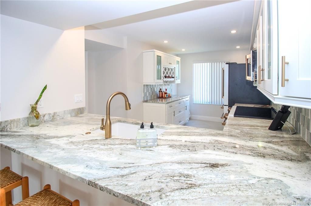 4440 NE Sandpebble Trace, Unit 201, Stuart, FL 34996 Photo