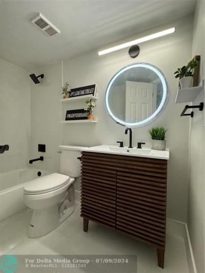 8891 Wiles Road, Unit 208, Coral Springs, FL 33067 Photo