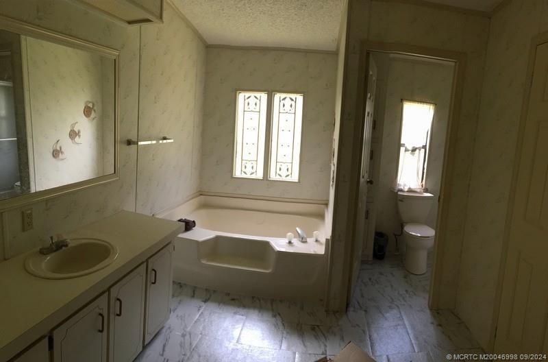 14642 SW Divot Drive Sw, Indiantown, FL 34956 Photo