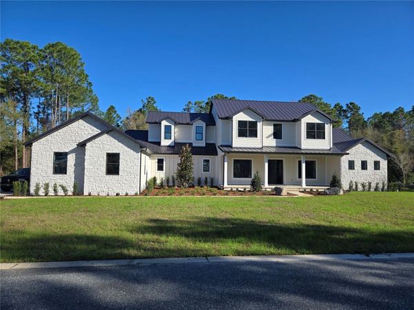 405 LONG AND WINDING ROAD, HOWEY IN THE HILLS, FL 34737