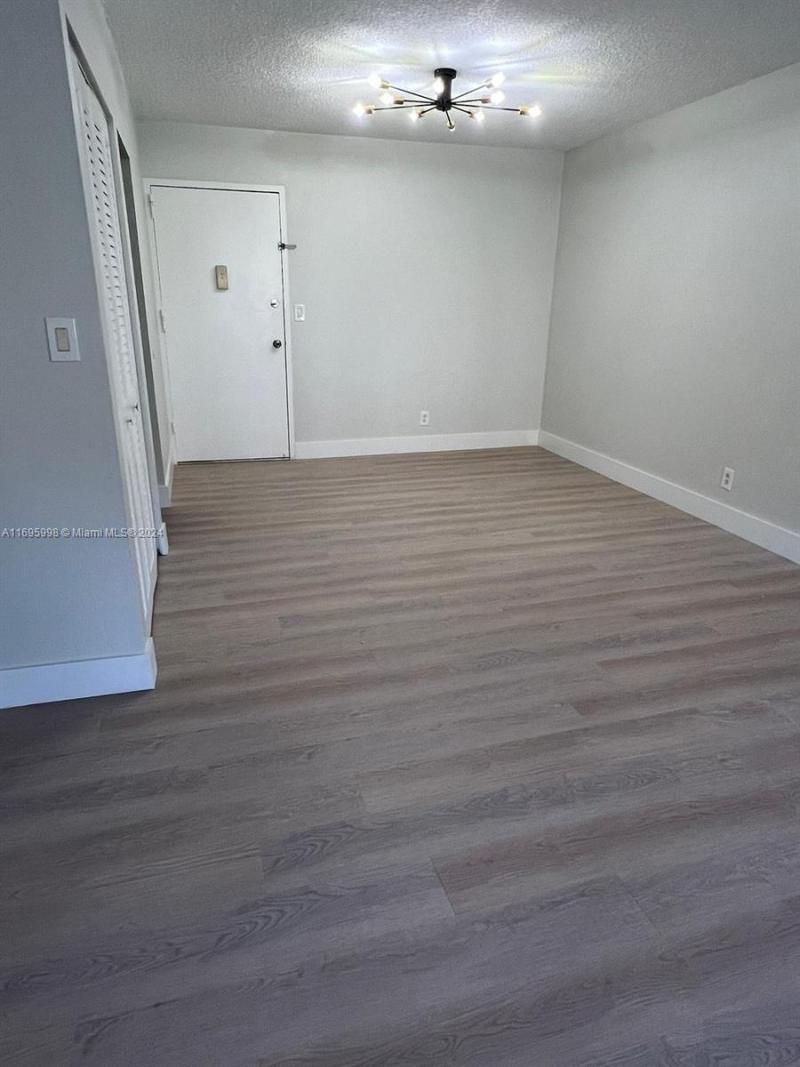 401 Golden Isles Dr, Unit 303, Hallandale Beach, FL 33009 Photo