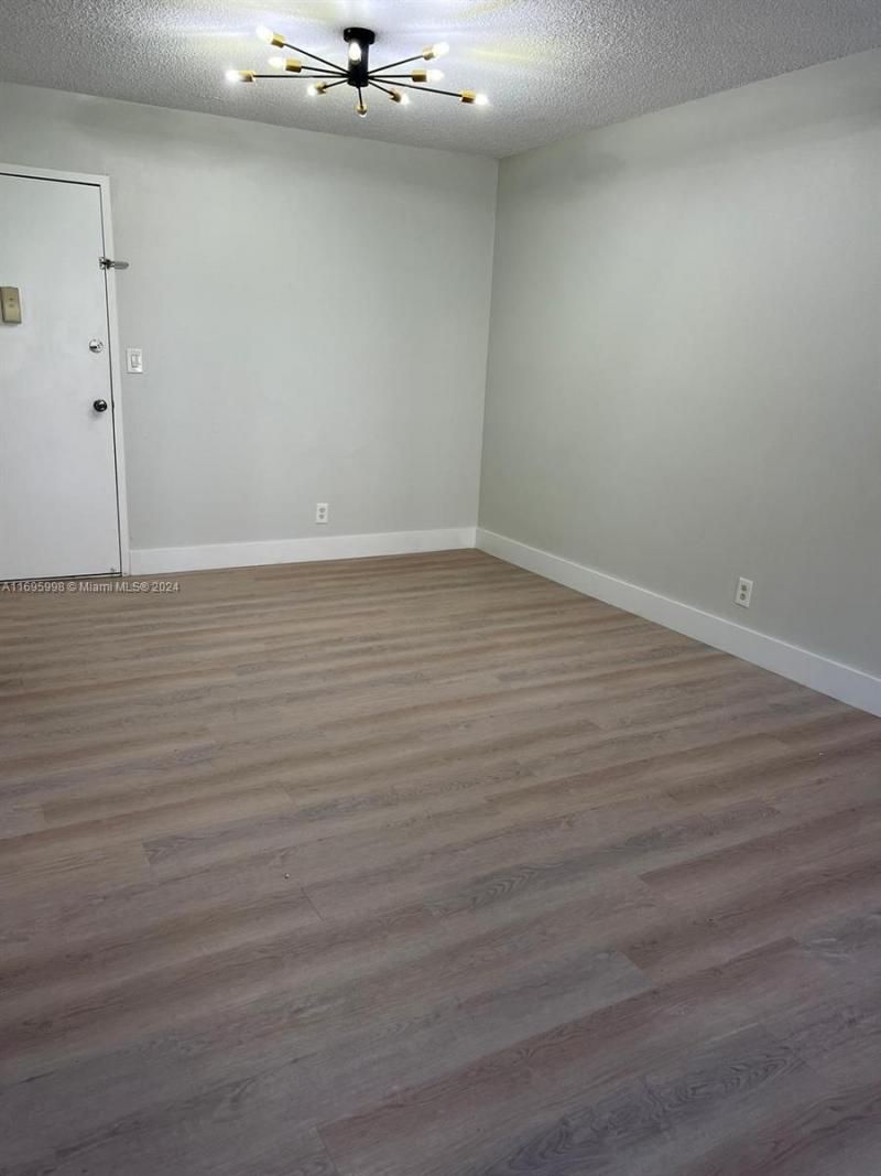 401 Golden Isles Dr, Unit 303, Hallandale Beach, FL 33009 Photo