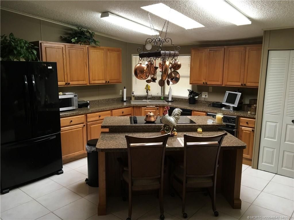 14301 SW Divot Drive, Indiantown, FL 34956 Photo