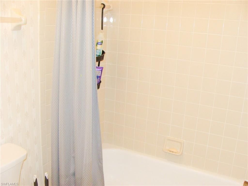 5693 Rattlesnake Hamm Rd, Unit A-204, Naples, FL 34113 Photo