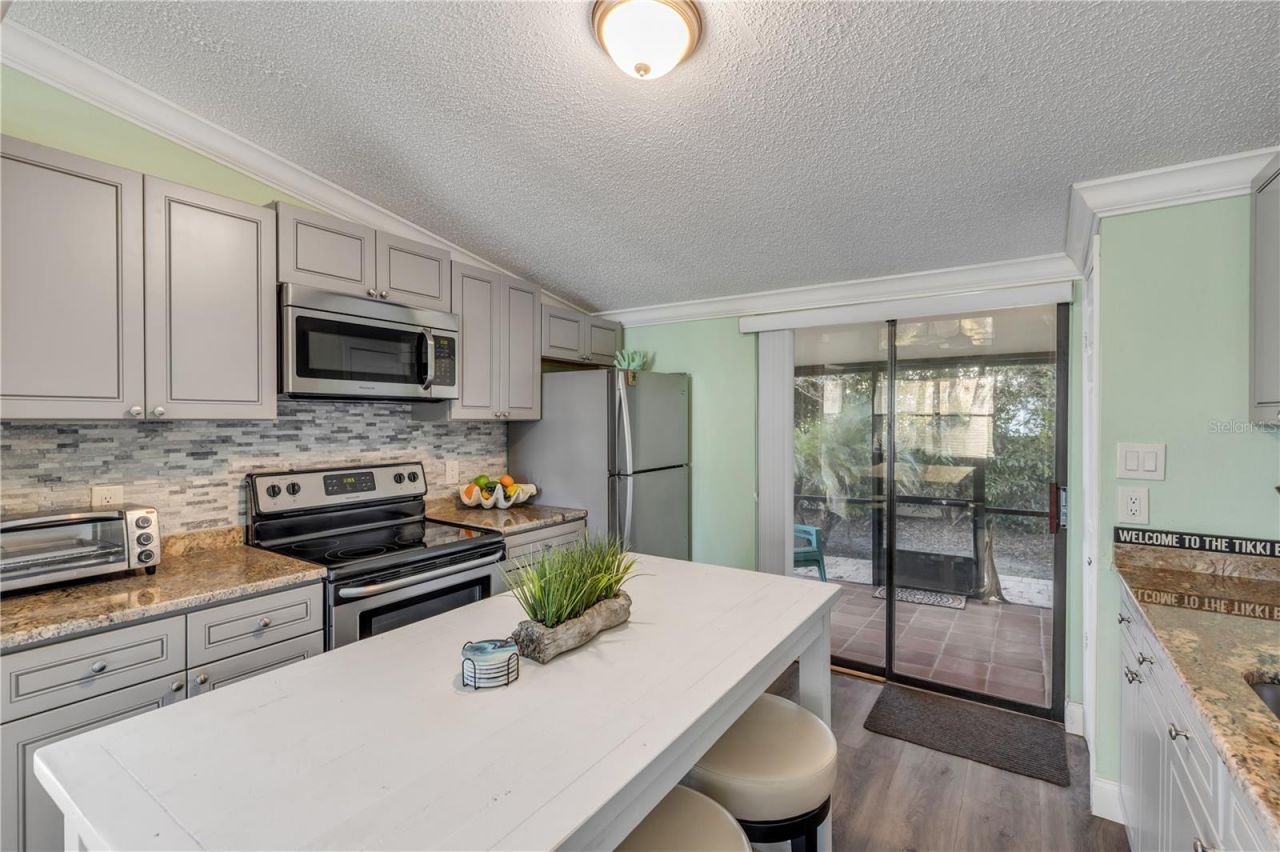 49 Jacaranda Cay Court, Unit 49, New Smyrna Beach, FL 32169 Photo