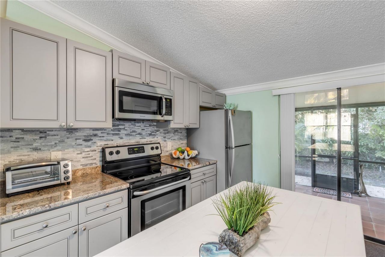 49 Jacaranda Cay Court, Unit 49, New Smyrna Beach, FL 32169 Photo