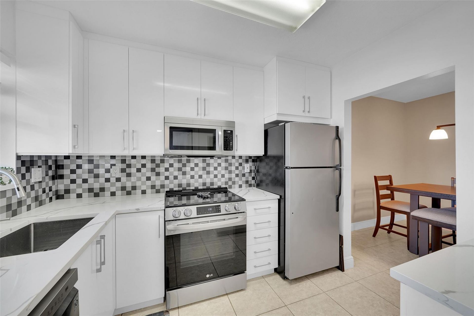 300 Golden Isles Drive, Unit 206, Hallandale Beach, FL 33009 Photo