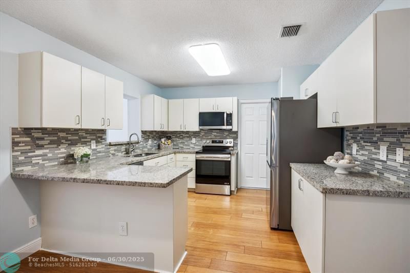 12100 NW 27th Ct, Plantation, FL 33323 Photo