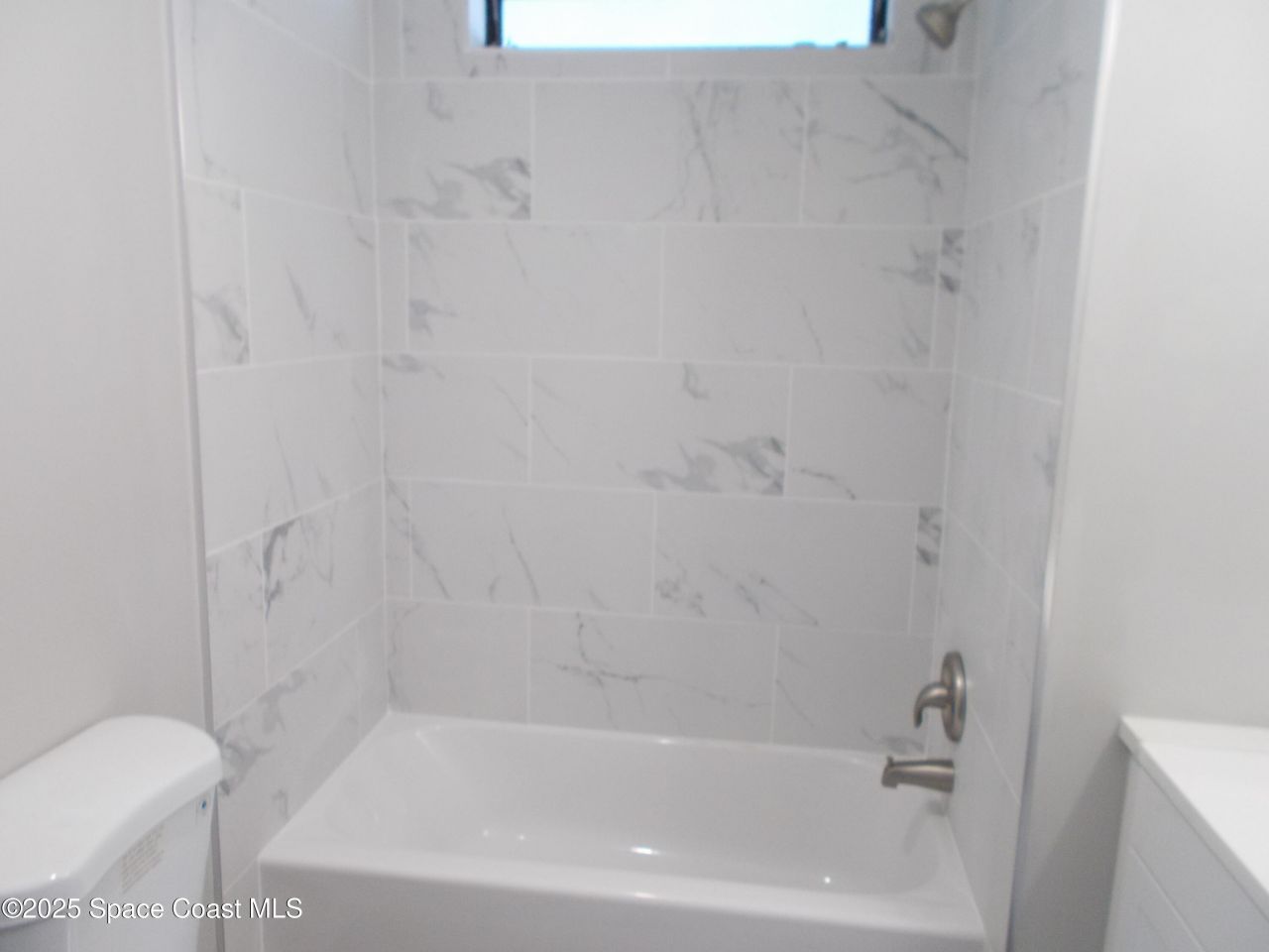 619 Sea Gull Drive W, Barefoot Bay, FL 32976 Photo