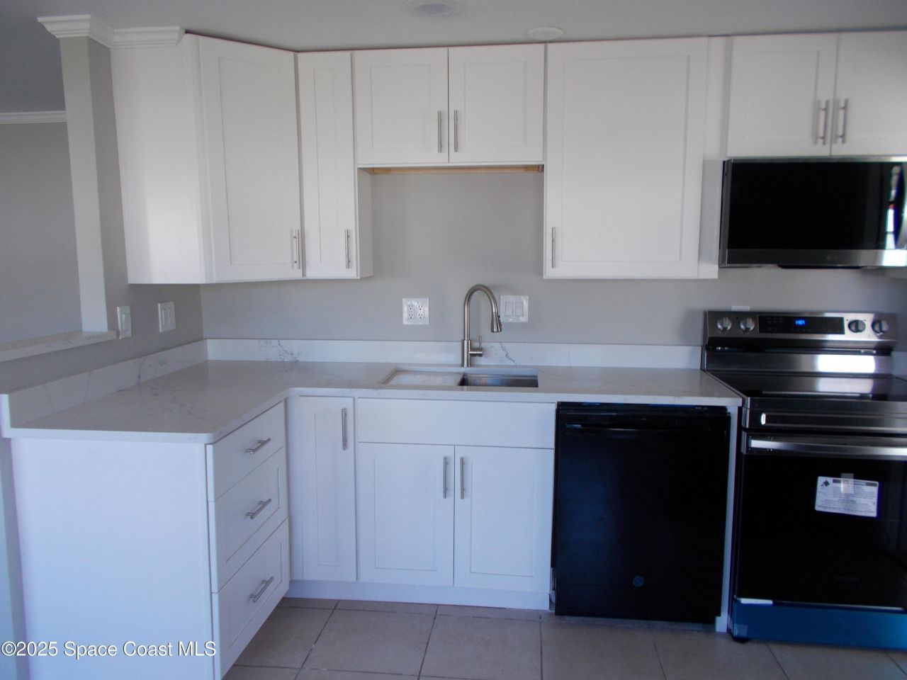 619 Sea Gull Drive W, Barefoot Bay, FL 32976 Photo