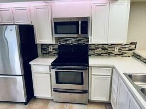 2441 Village Boulevard, Unit 102, West Palm Beach, FL 33409 Photo