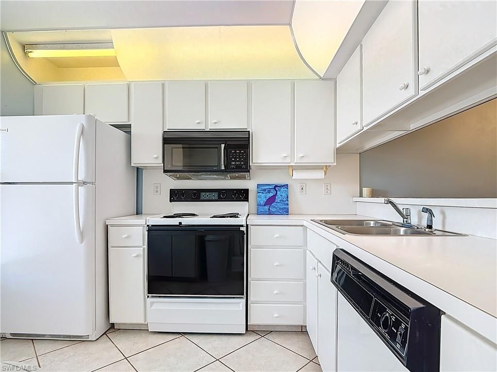 1025 Mainsail Dr, Unit 215, Naples, FL 34114 Photo