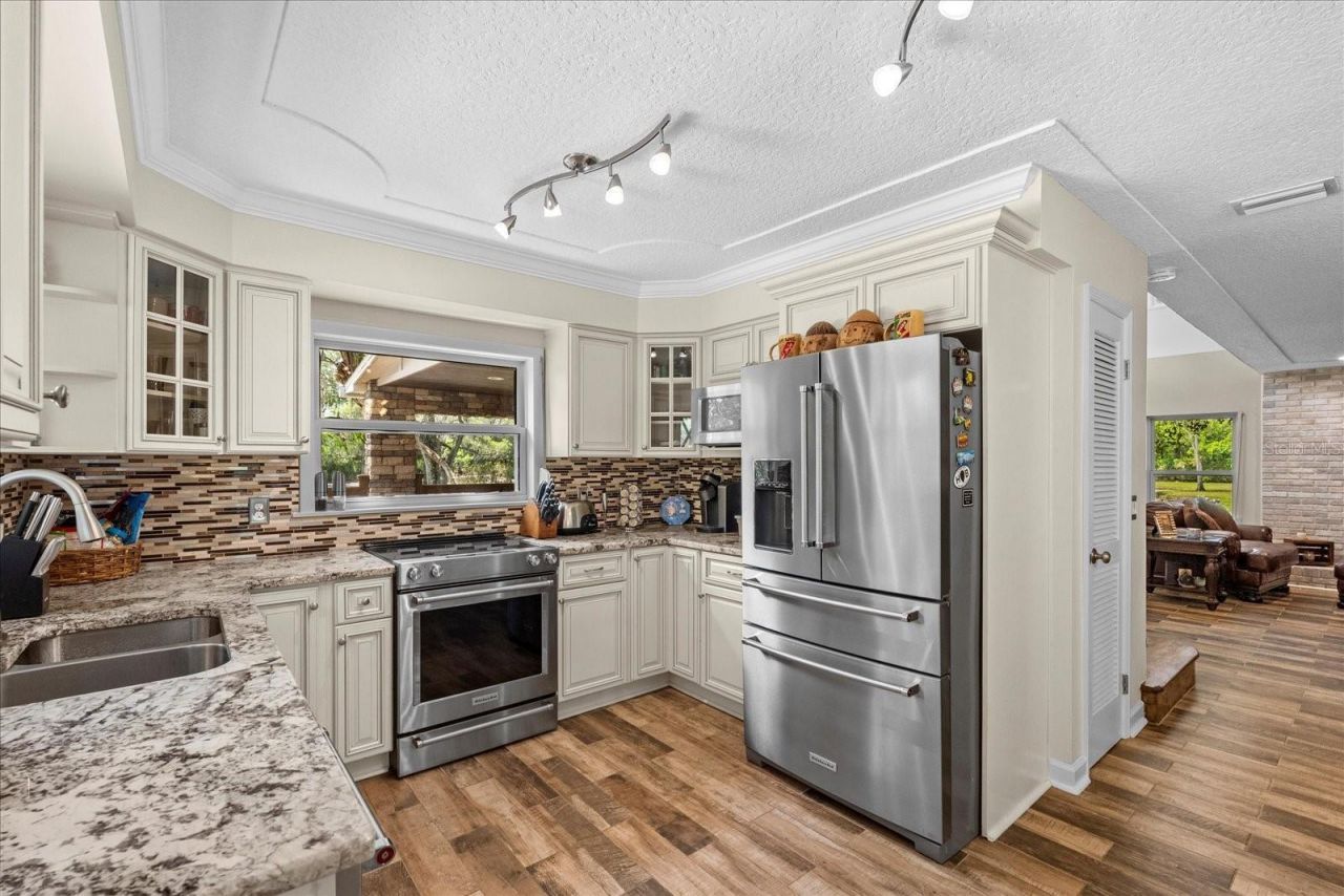 800 Hidden Oaks Lane, Oak Hill, FL 32759 Photo