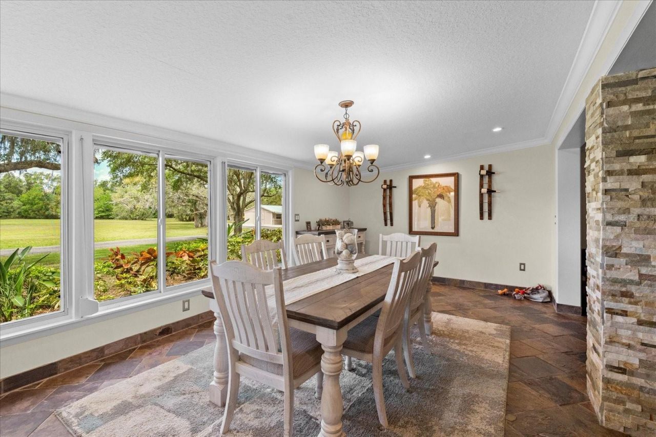 800 Hidden Oaks Lane, Oak Hill, FL 32759 Photo