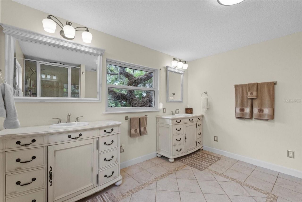 800 Hidden Oaks Lane, Oak Hill, FL 32759 Photo