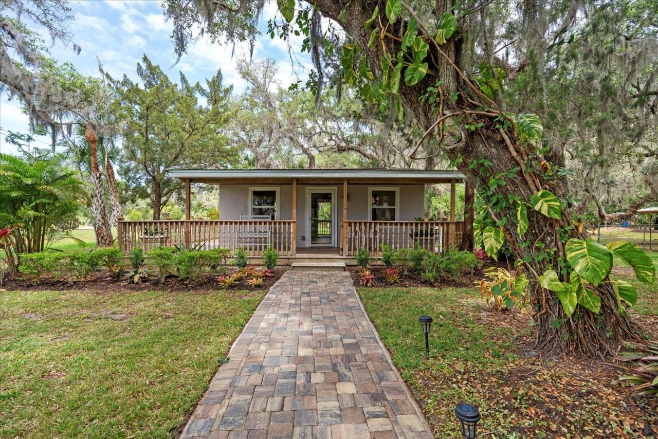 800 Hidden Oaks Lane, Oak Hill, FL 32759 Photo