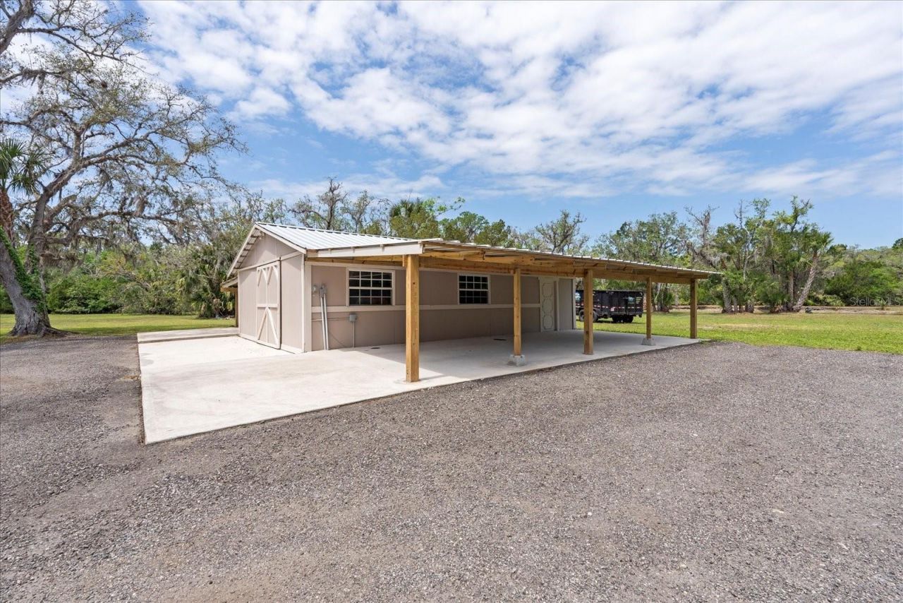 800 Hidden Oaks Lane, Oak Hill, FL 32759 Photo