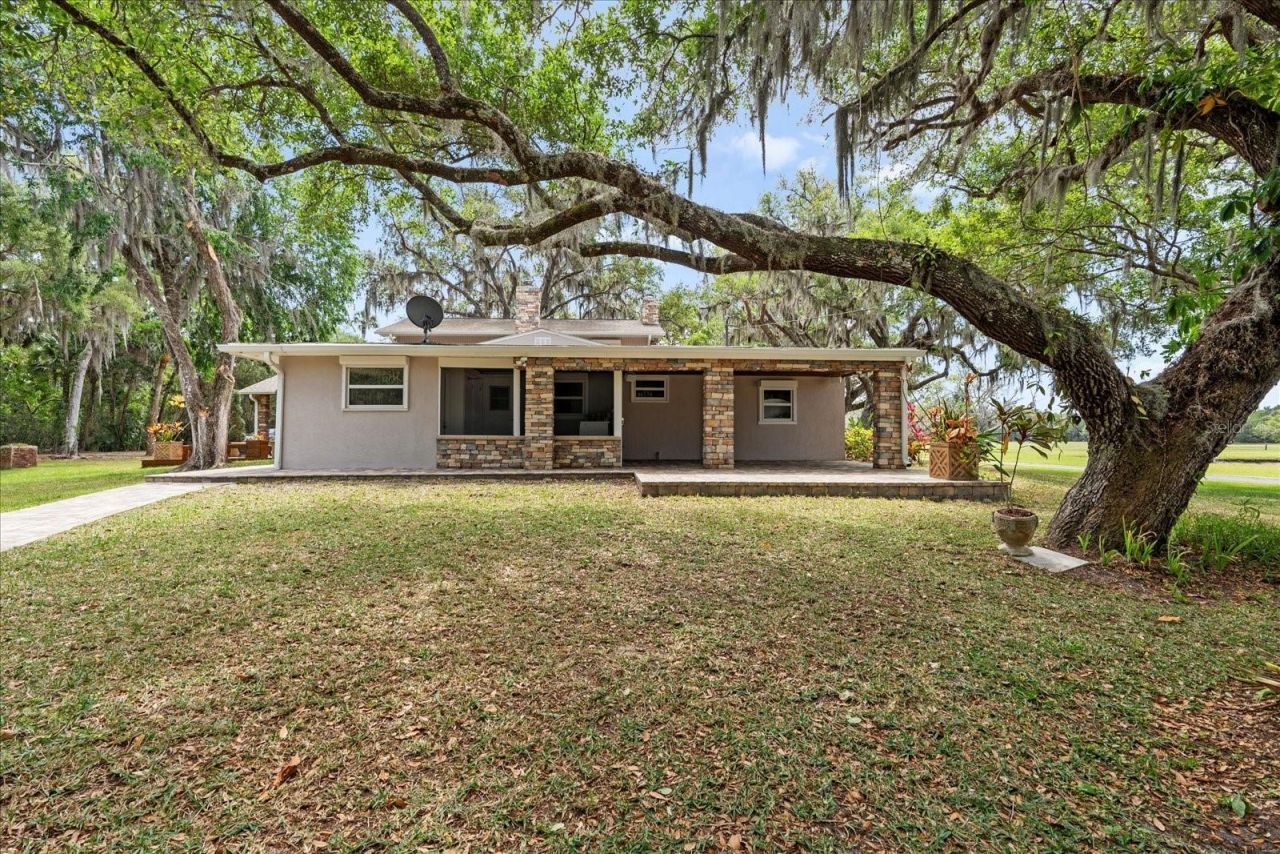 800 Hidden Oaks Lane, Oak Hill, FL 32759 Photo