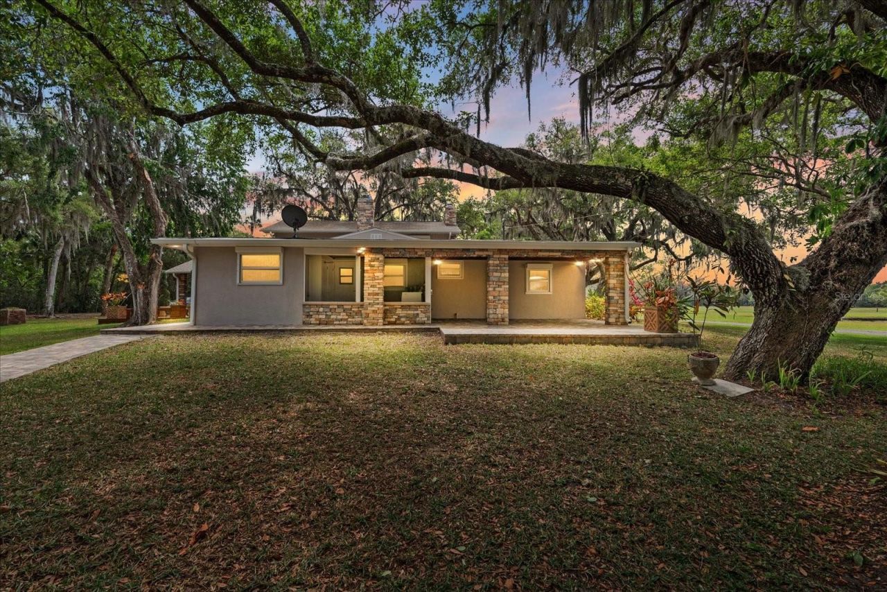 800 Hidden Oaks Lane, Oak Hill, FL 32759 Photo