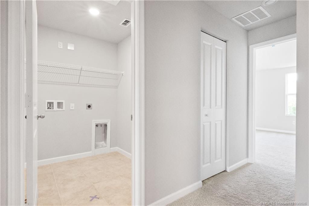 162 W Osprey Preserve Boulevard, Jensen Beach, FL 34957 Photo