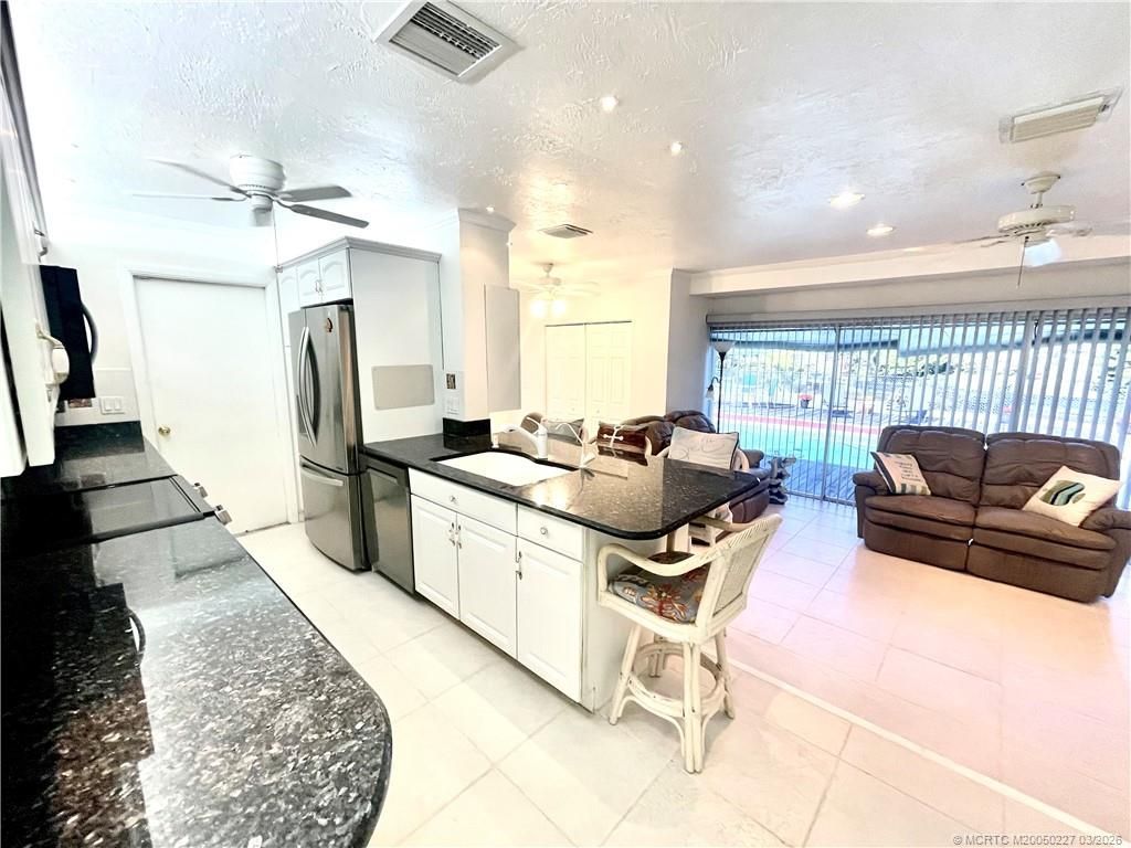 880 SE Degan Drive, Port Saint Lucie, FL 34983 Photo