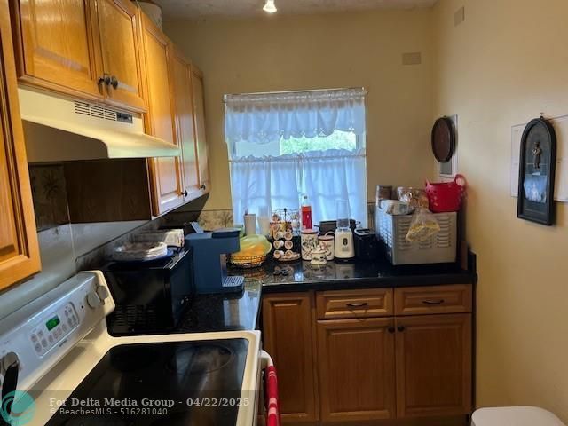 9330 Lagoon Place, Unit 406, Davie, FL 33324 Photo