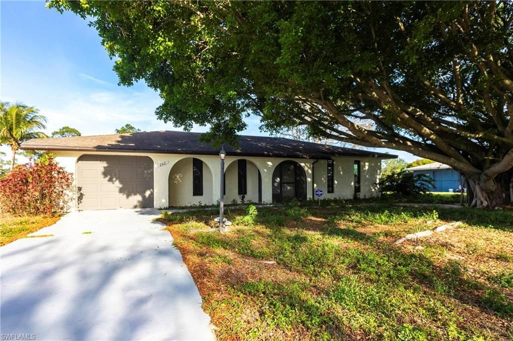 242 Ground Dove Cir, Lehigh Acres, FL 33936 Photo