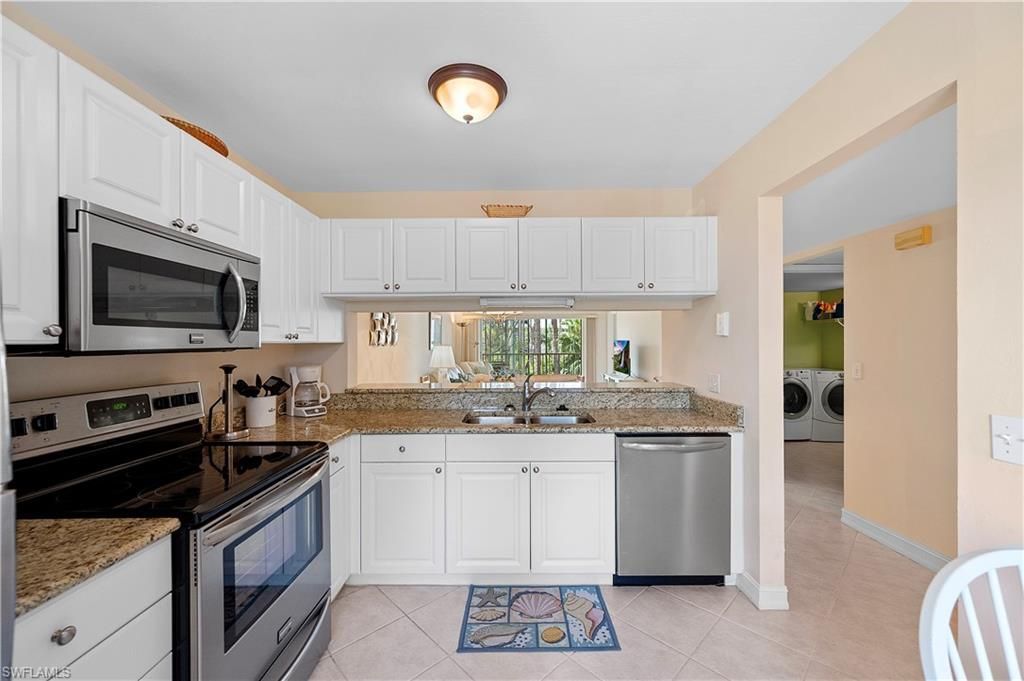 3072 Sandpiper Bay Cir, Unit M202, Naples, FL 34112 Photo