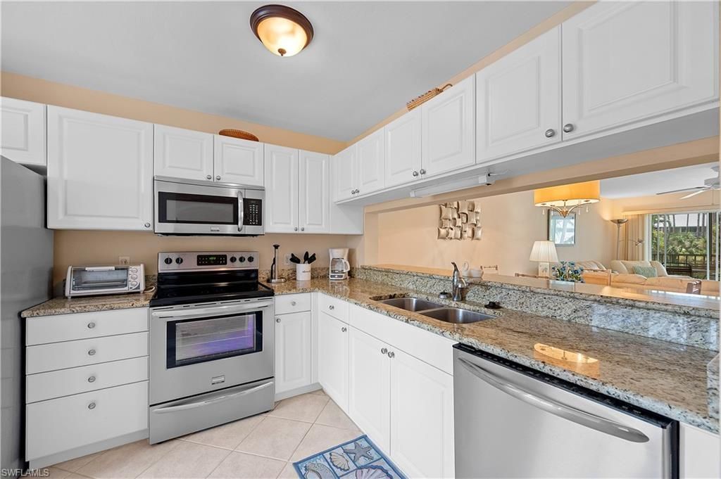 3072 Sandpiper Bay Cir, Unit M202, Naples, FL 34112 Photo