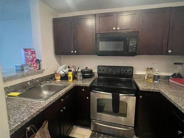 482 NW 165th St Rd, Unit A203, Miami, FL 33169