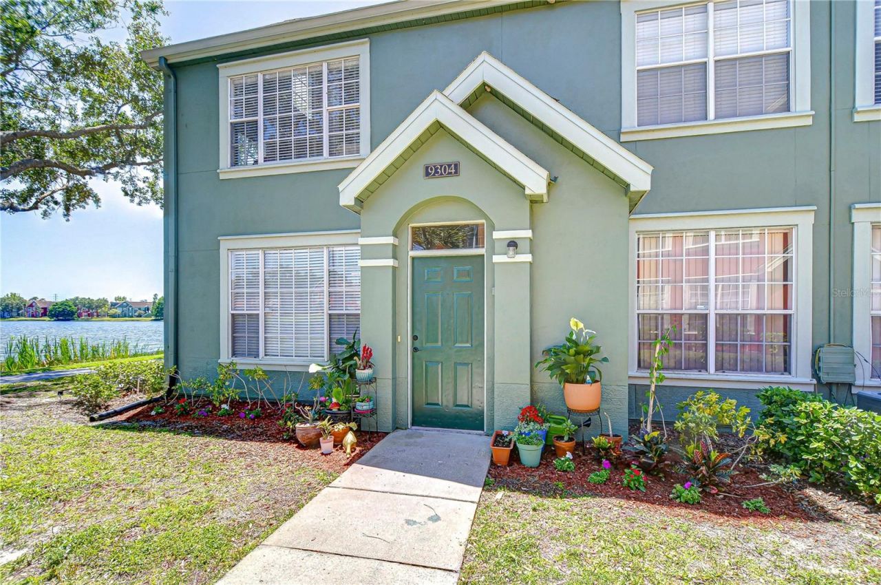 9304 Lake Chase Island Way, Tampa, FL 33626 Main Photo