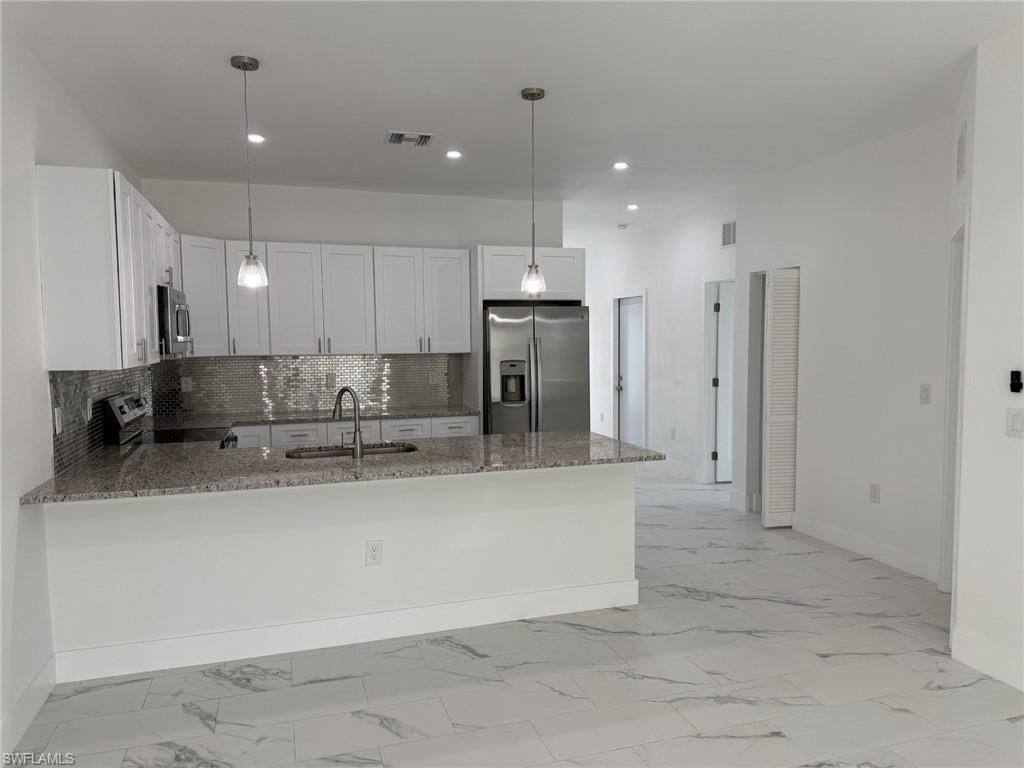 5253-5255 Centennial Blvd, Lehigh Acres, FL 33971 Photo