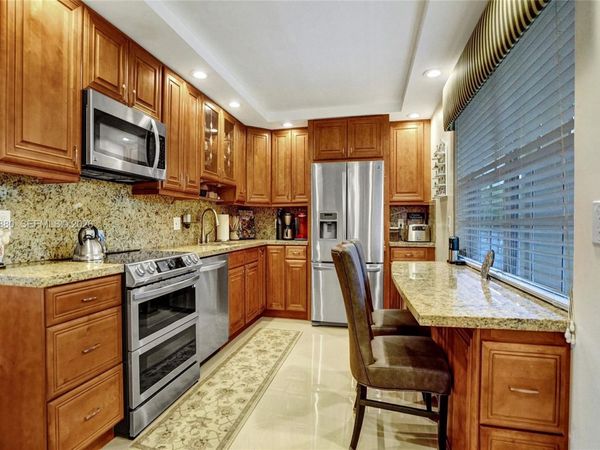 3520 Oaks Way, Unit 308, Pompano Beach, FL 33069