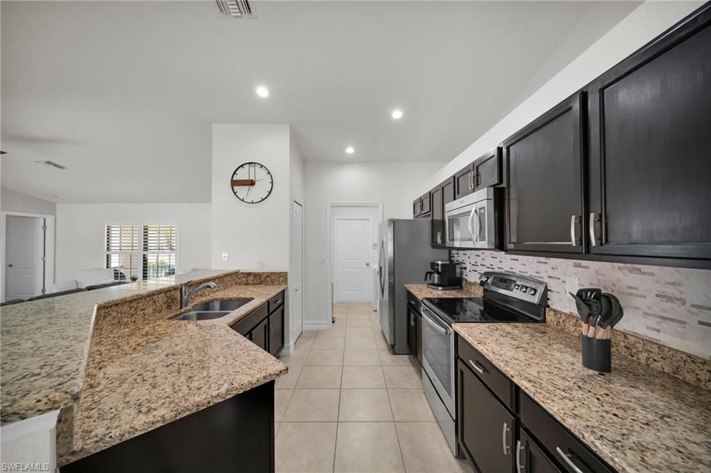 3721 SW 13th Ave, Cape Coral, FL 33914 Photo