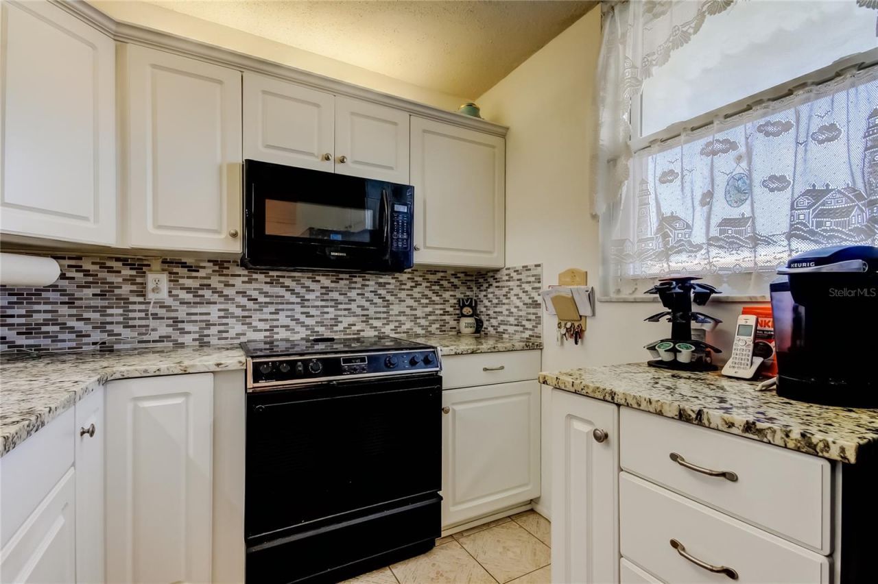 7465 Bay Island Drive S, Unit 213, South Pasadena, FL 33707 Photo