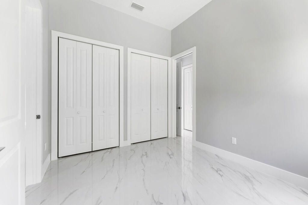 675 NE Moss Rose Place, Port Saint Lucie, FL 34983 Photo