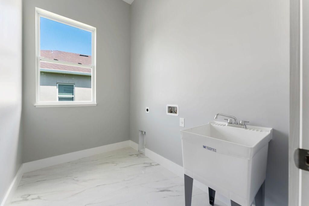 675 NE Moss Rose Place, Port Saint Lucie, FL 34983 Photo