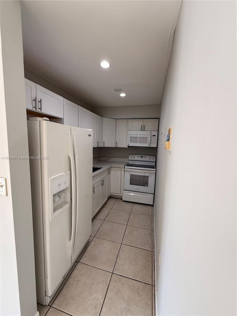4705 NW 7th St, Unit 203-7, Miami, FL 33126 Photo
