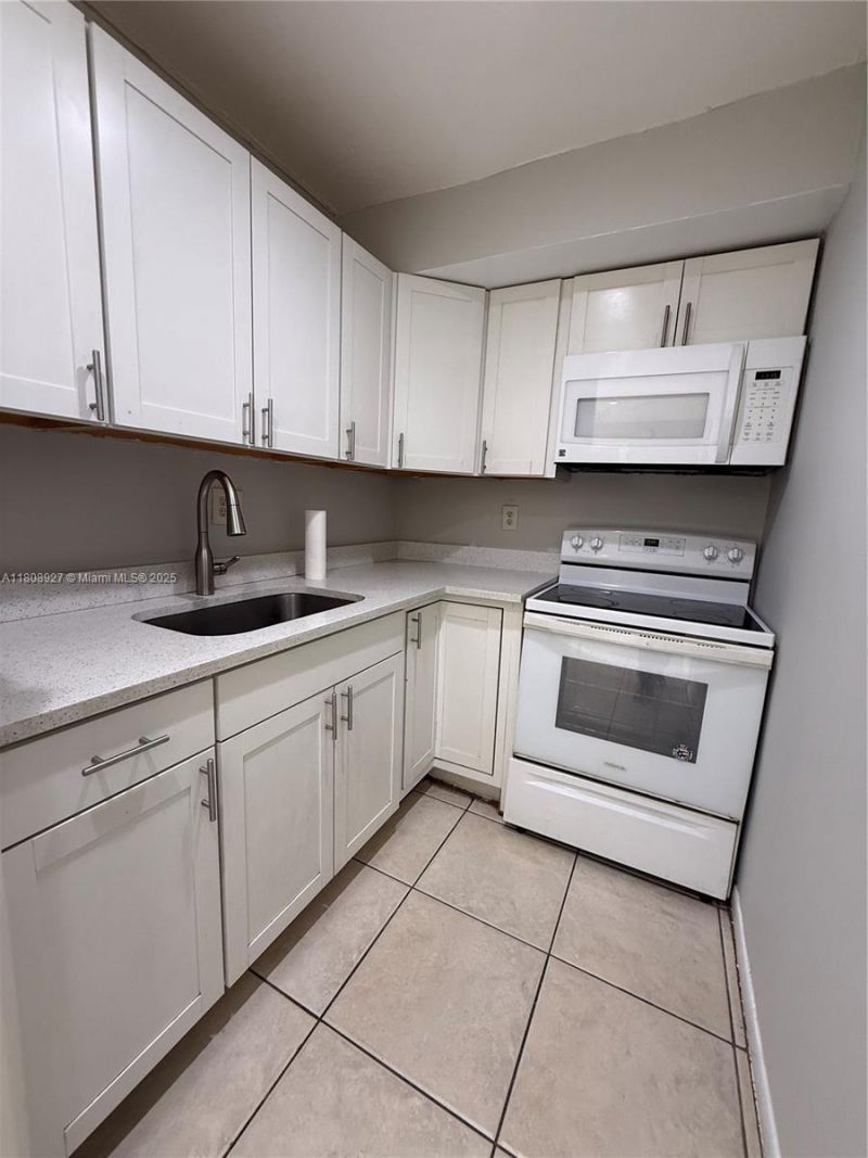 4705 NW 7th St, Unit 203-7, Miami, FL 33126 Photo
