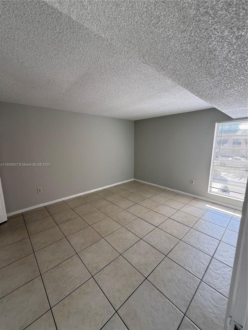 4705 NW 7th St, Unit 203-7, Miami, FL 33126 Photo