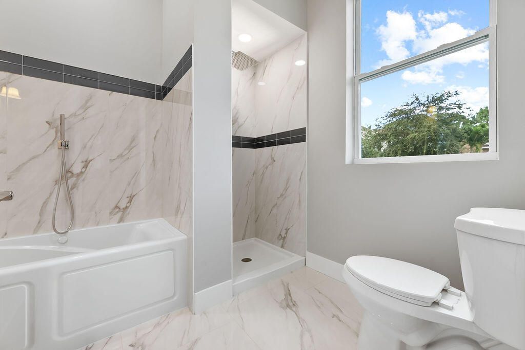 660 NE Moss Rose Place, Port Saint Lucie, FL 34983 Photo