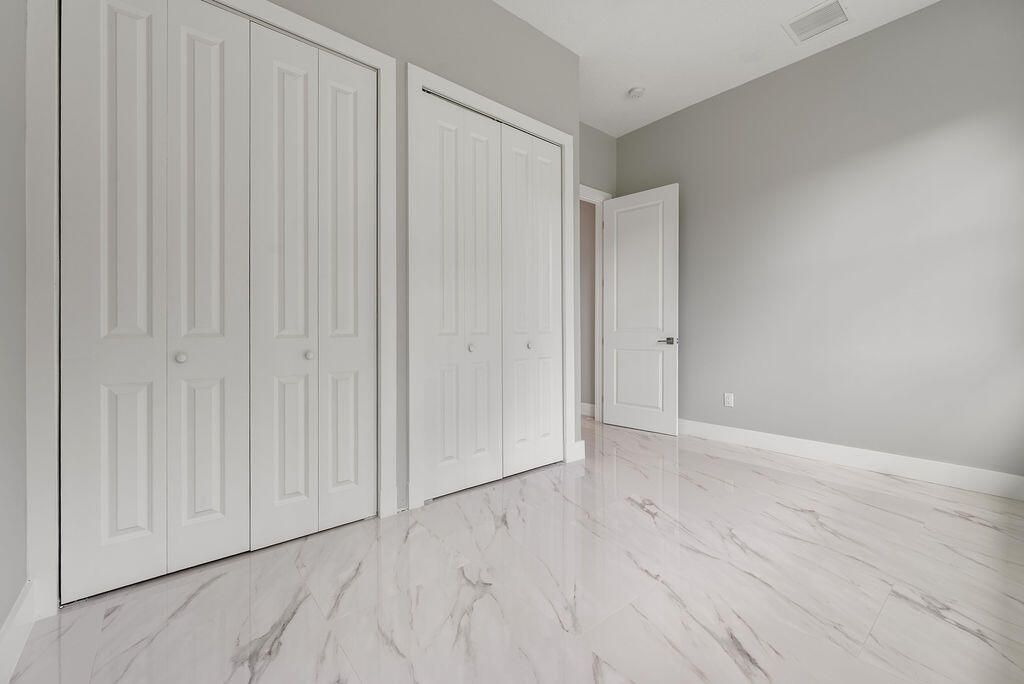 660 NE Moss Rose Place, Port Saint Lucie, FL 34983 Photo