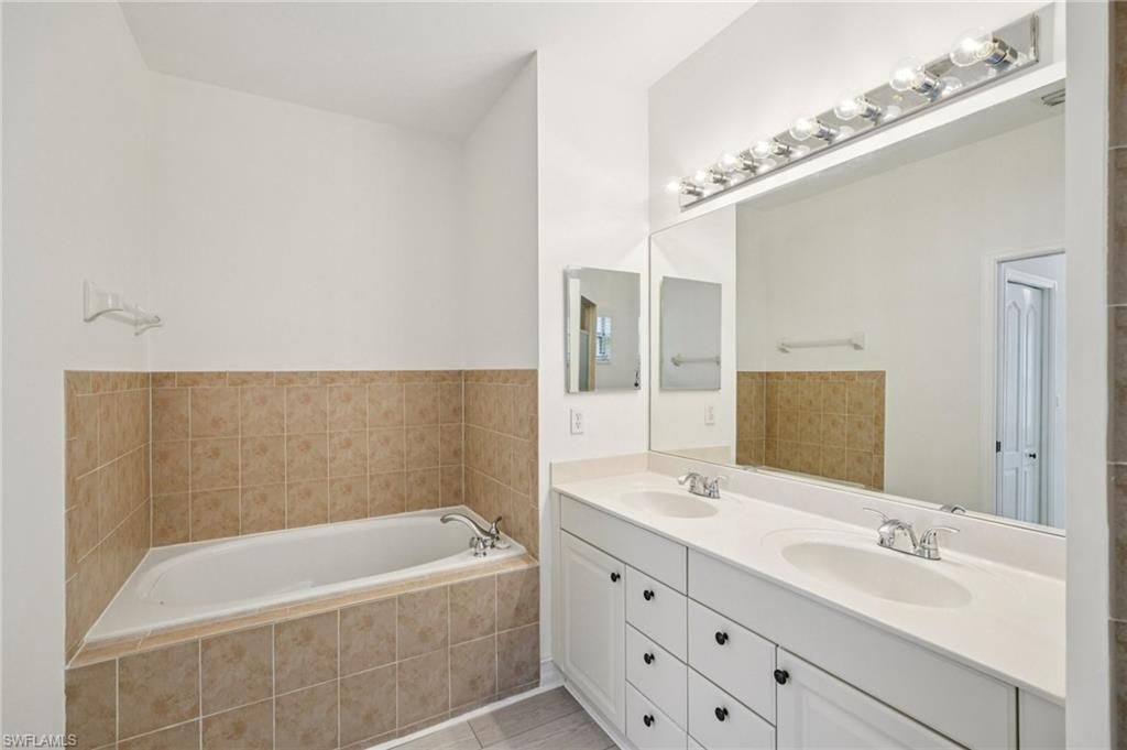 8088 Sanctuary Dr, Unit 1, Naples, FL 34104 Photo