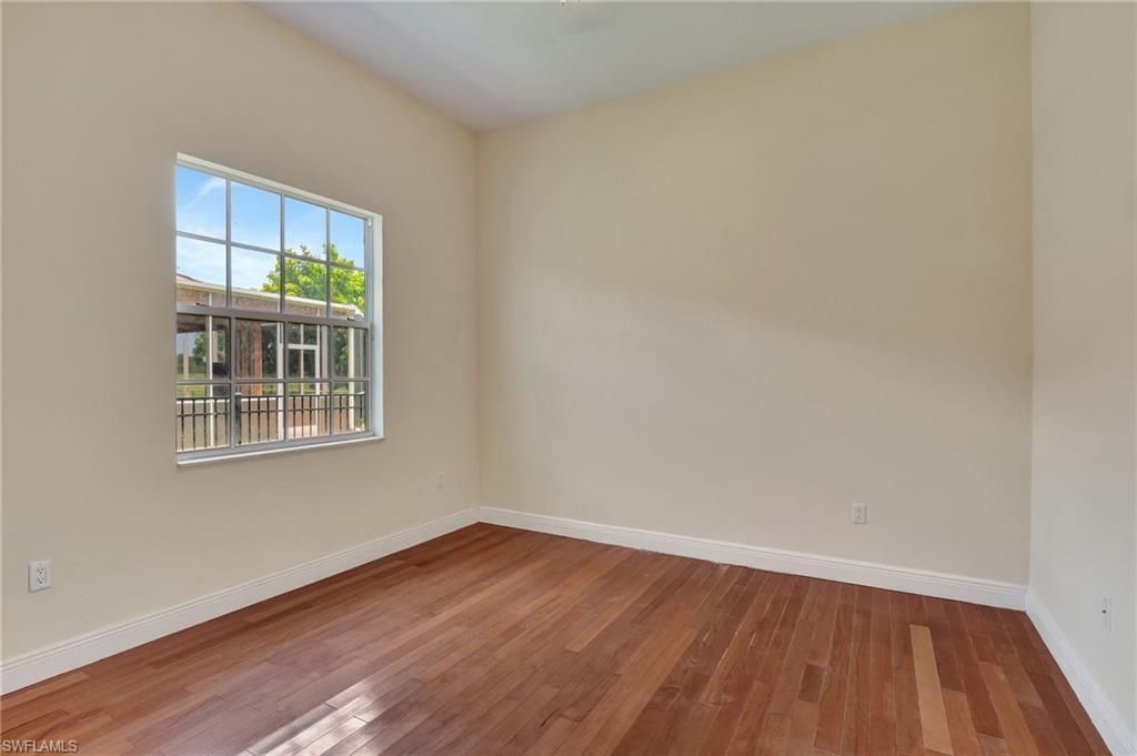 680 Mirror Lakes Ct, Lehigh Acres, FL 33974 Photo