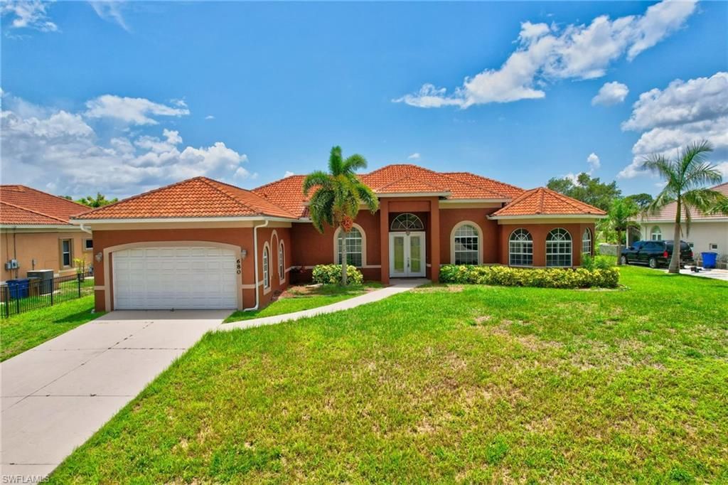 680 Mirror Lakes Ct, Lehigh Acres, FL 33974 Photo
