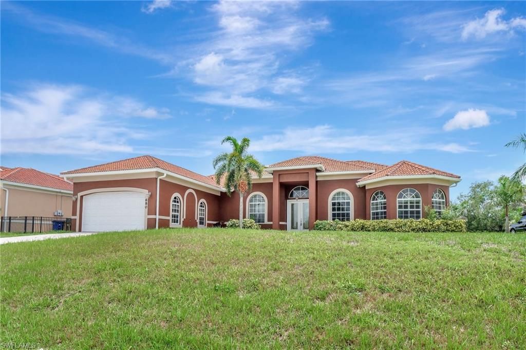 680 Mirror Lakes Ct, Lehigh Acres, FL 33974 Photo